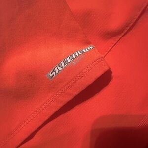 Beautiful Sketchers scrubs , coral size med